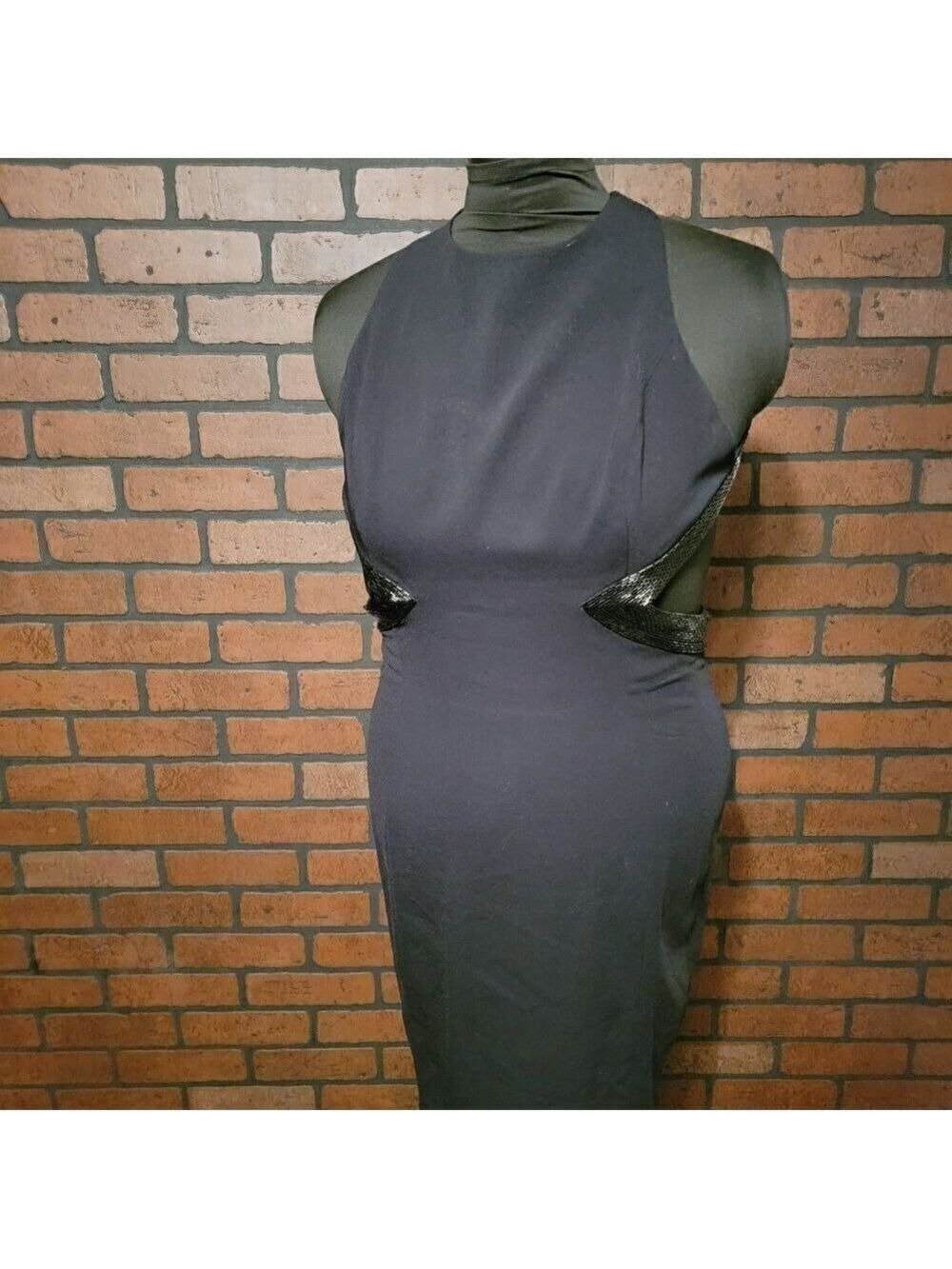 Vintage Nah Nah Collection. Black open cutouts on the sides with crisscross back